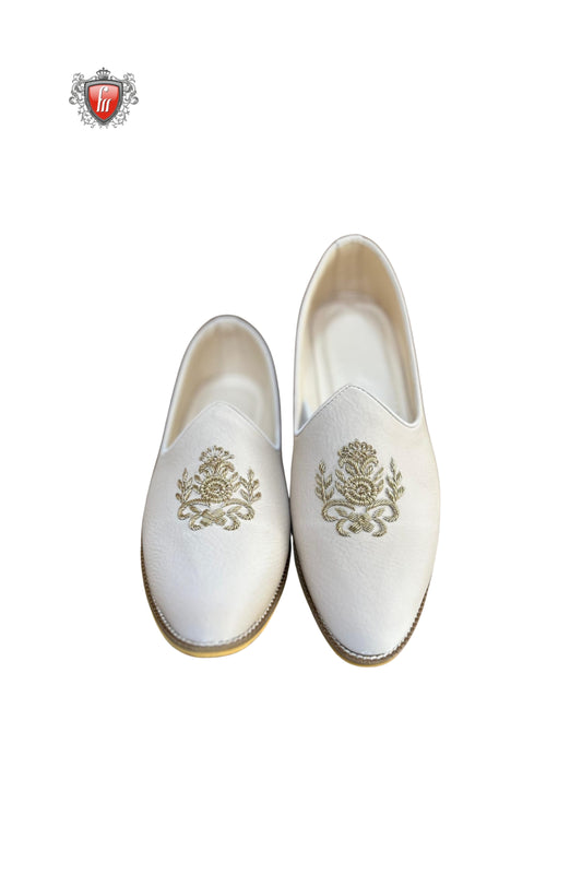 White Textured Jutti with Golden Floral Crest Embroidery