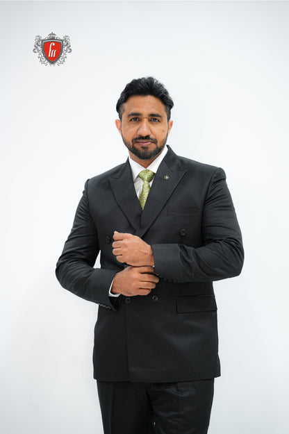 Refined Men’s Black Double-Breasted Suit with Classic Green Tie - The Mark of a True Gentleman