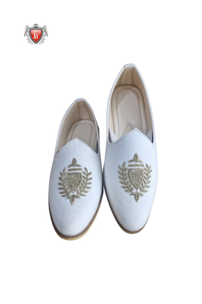 Men’s White Ethnic Jutti with Golden Crest Embroidery – Handcrafted Wedding Footwear