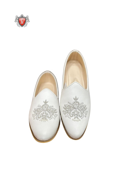 White Textured Jutti with Silver Embroidered Crest